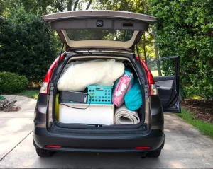 Car fully packed with student essentials for moving to University